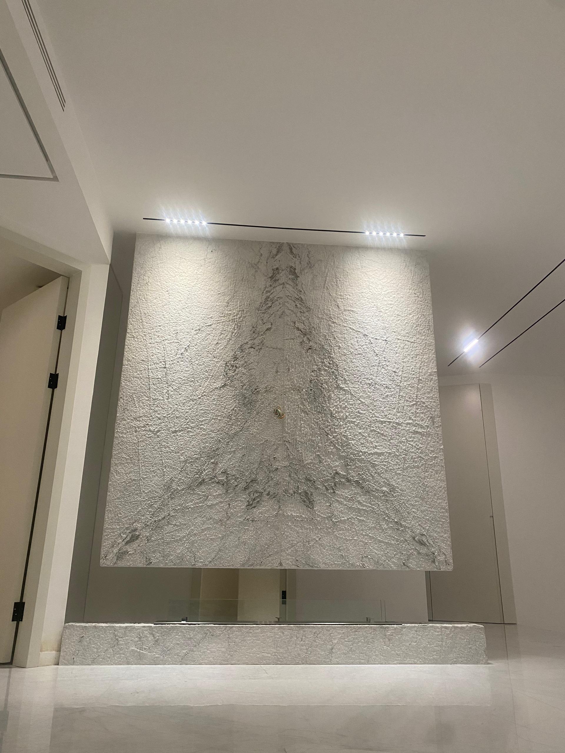 Book-matched natural stone feature wall